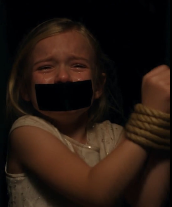 I found a little girl tied up behind a painting in a wealthy mansion during a party. When I tried to help her, the mansion owner calmly walked up and told me to put the frame back.