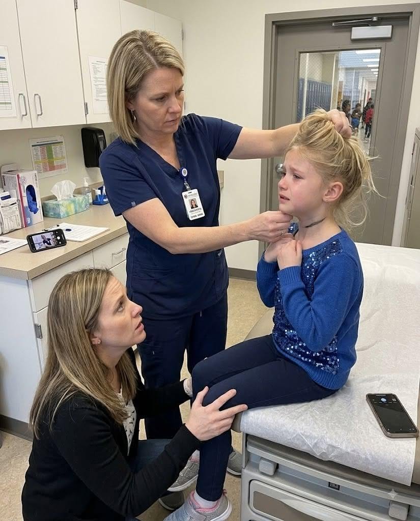 The call came at 12:15 PM on Tuesday, after Chloe refused lunch for the third time that week. By 12:27, I was kneeling on the cold floor of the nurse’s office while my seven-year-old sat on the examination table, chin tucked hard against her chest.