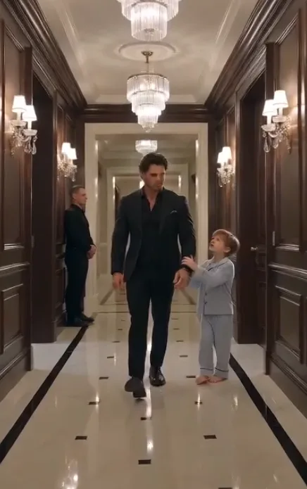 Ethan (Man in Suit): 30s handsome Caucasian man, dark wavy styled hair