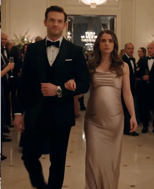 Grant enters the crowded family celebration with pregnant Kelsey on his arm.
