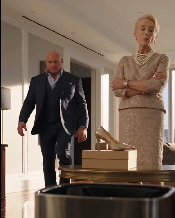 Vanessa snatches the shoes from Lily’s hands and throws them into the trash.