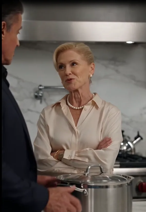 Eleanor slams the heavy cooking pot onto the kitchen counter beside exhausted Alessia.