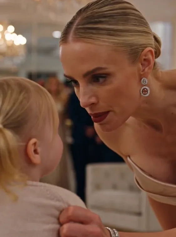 Victoria Hayes whispered it while gripping three-year-old Lily by the shoulder.