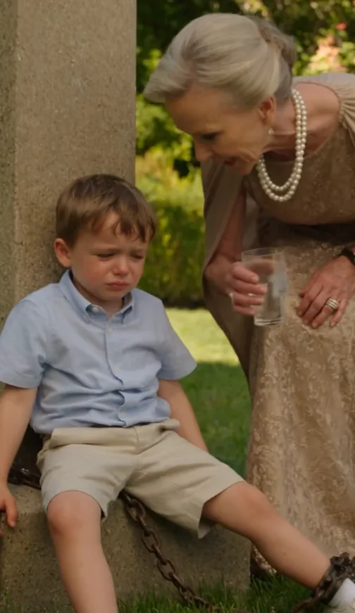 Three-year-old Elliot Bellafonte was chained by one ankle to a stone garden column beneath the afternoon sun.