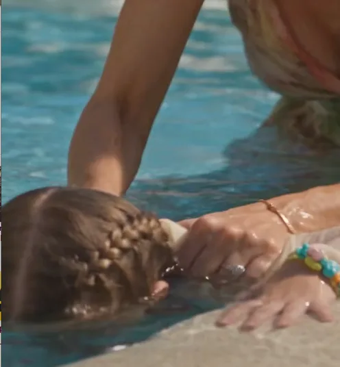 Vivienne Moretti had five-year-old Audrey pinned against the shallow pool steps.