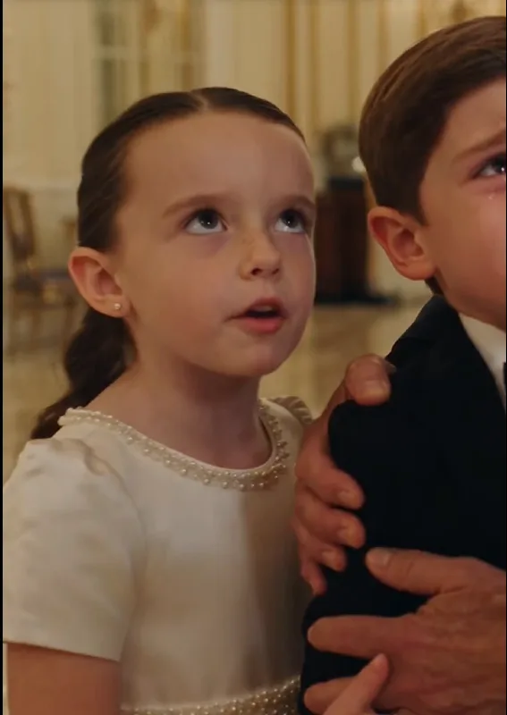 Victoria Hayes grabbed three-year-old Eli Caruso by the jaw and forced him down onto his knees in the middle of the Bellacorte-family reception.