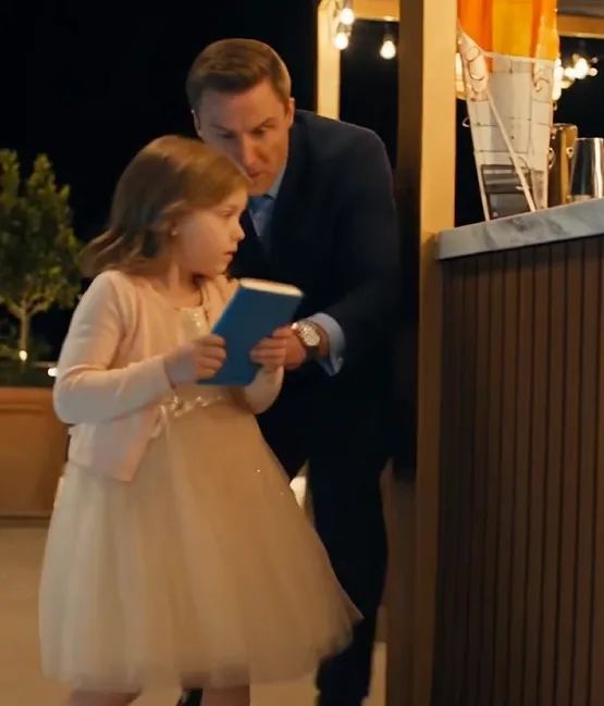 Four-year-old Lila Bellacorte suddenly grabbed her father’s suit sleeve in the middle of the engagement celebration.