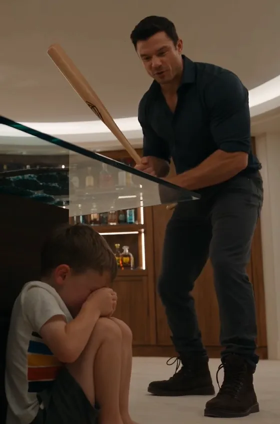 Four-year-old Leo Bellandi was curled against the side of the glass game table with both arms shielding his head.