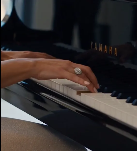Victoria Lane sat at the grand piano in the middle of the Moretti family engagement reception and began playing a short melody.