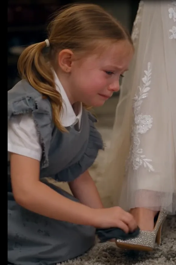Four-year-old Sofia Vaughn was kneeling beside a wooden shoe-polishing stool when her father came home.