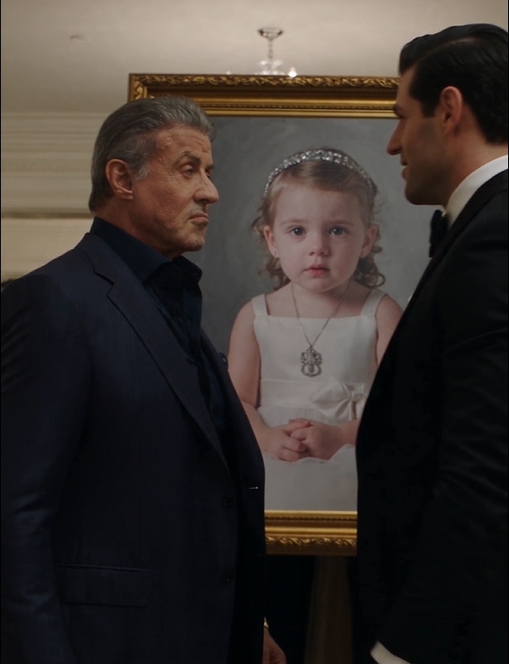 At a crowded anniversary dinner, three-year-old Ottilie was wearing an oversized dress and pendant that exactly matched the clothes worn by a dead girl in a framed portrait nearby.