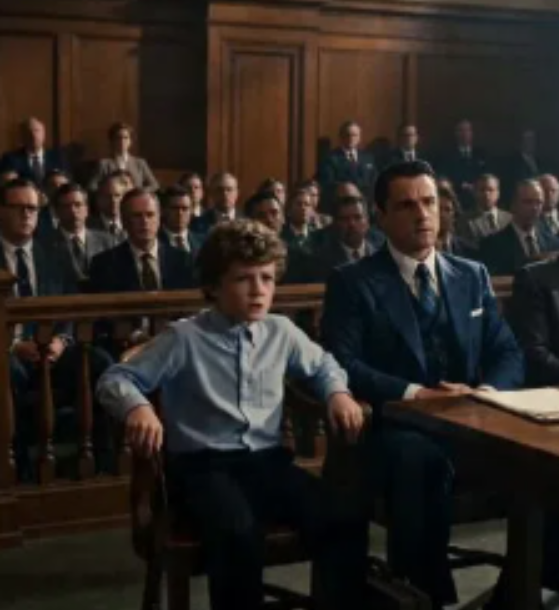 PART 2: The courtroom had been filled with quiet tension—papers shifting, whispers floating between rows—until a chair suddenly scraped loudly across the floor, cutting through everything like a blade.