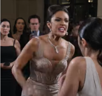 Part 2: The entire hotel lobby froze the second the champagne hit her face.