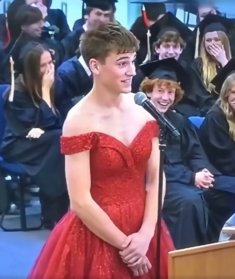 On the evening of his high school commencement, my son walked onto the stage wearing a sweeping emerald gown.