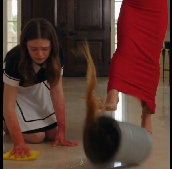The wealthy stepmother relaxed with a glass of wine while a crying maid scrubbed the mansion floor… until the front door suddenly opened.