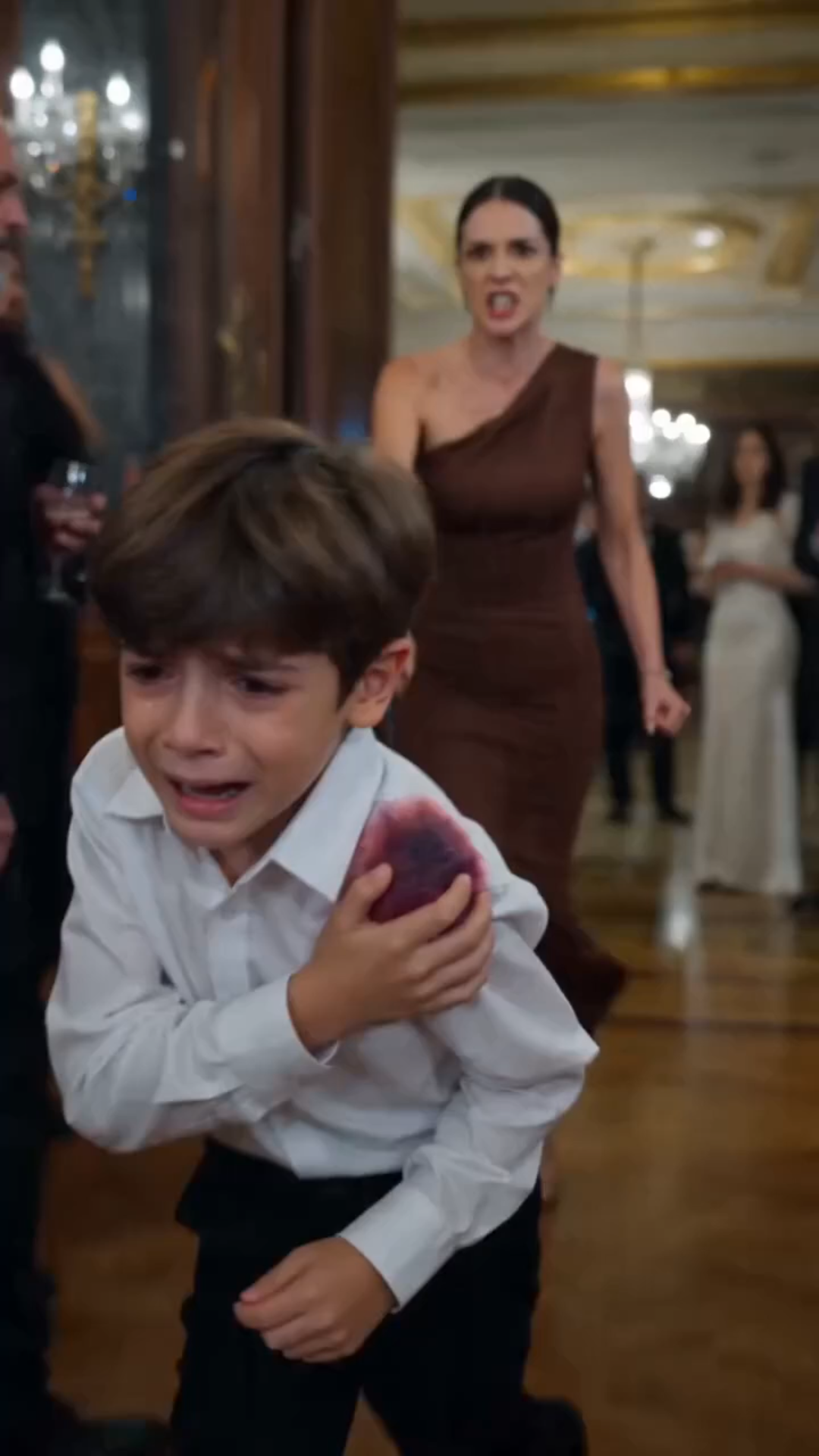 THE BOY CRASHED A BILLIONAIRE GALA COVERED IN BLOOD—THEN CALLED A STRANGER IN A SILK GOWN “MOM,” AND THE ENTIRE ROOM FROZE