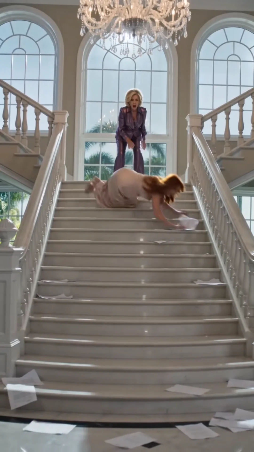 HIS MOTHER PUSHED HIS PREGNANT WIFE DOWN THE GRAND STAIRCASE—THEN HE SAW THE PAPERS FALLING BESIDE HER