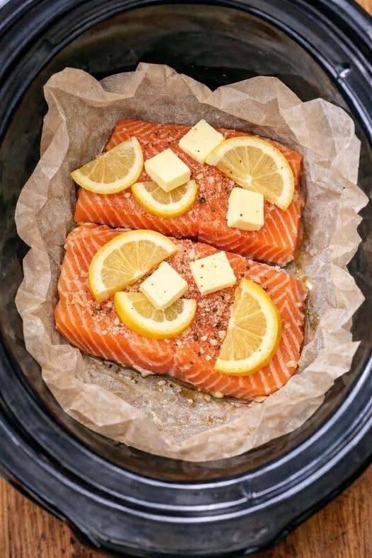 Set raw salmon fillets on parchment paper in the slow cooker. A few ingredients later? Wow. Full recipe