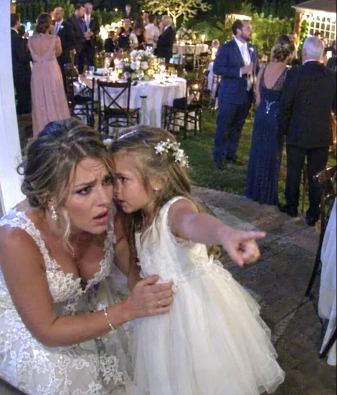 At my wedding reception, my new husband's little daughter tugged on my dress and asked, "Can I tell you Daddy's secret now that you're my mommy?" — but what she said next made my stomach drop.