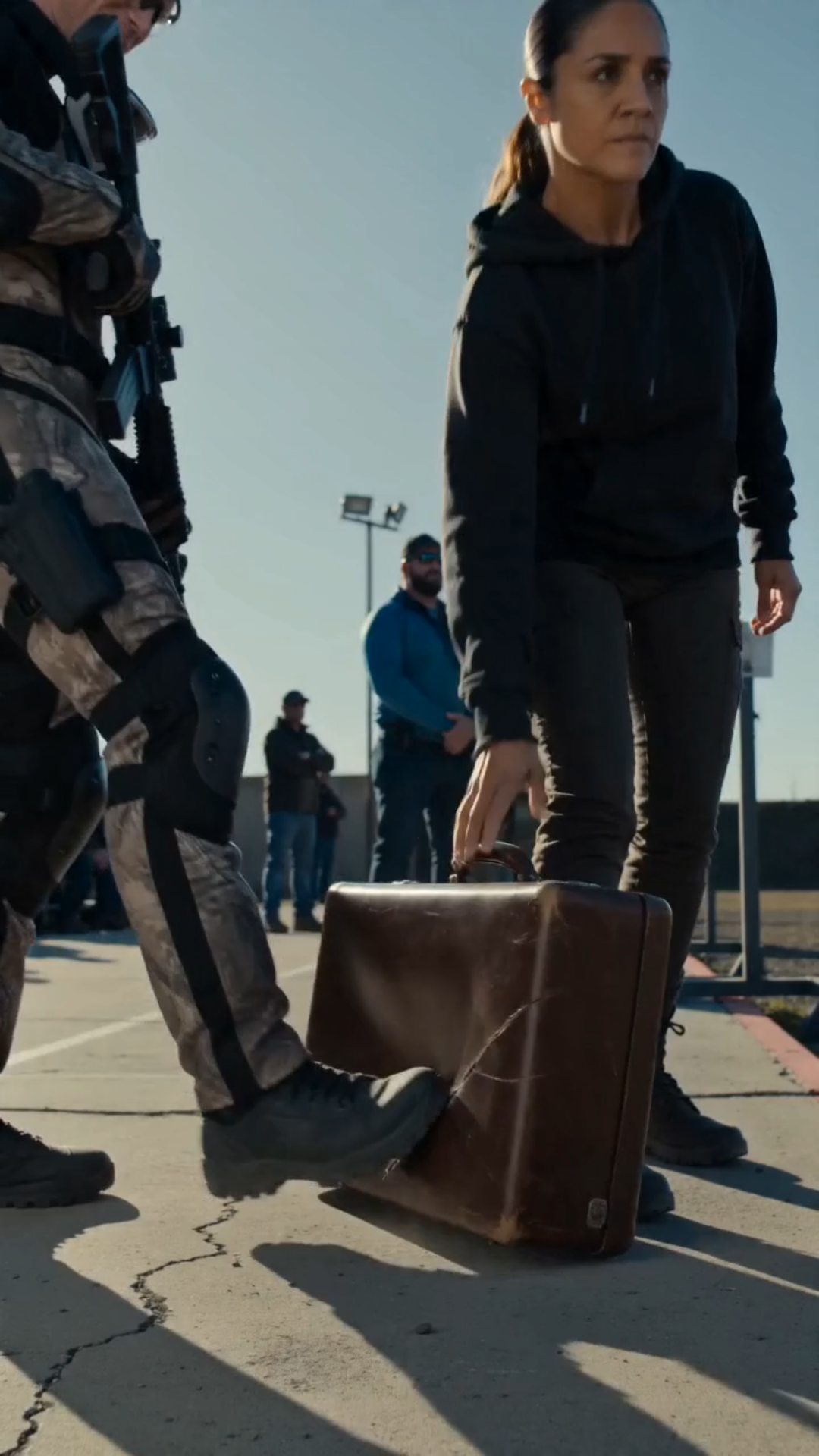 CHAPTER 1 The Woman With the Worn Rifle Case