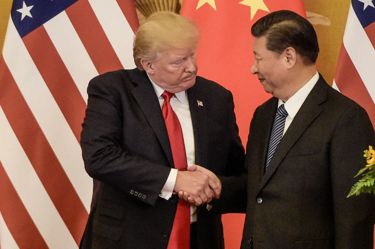 Trump lands in China for high-stakes summit with Xi Jinping, as Iran war looms over talks